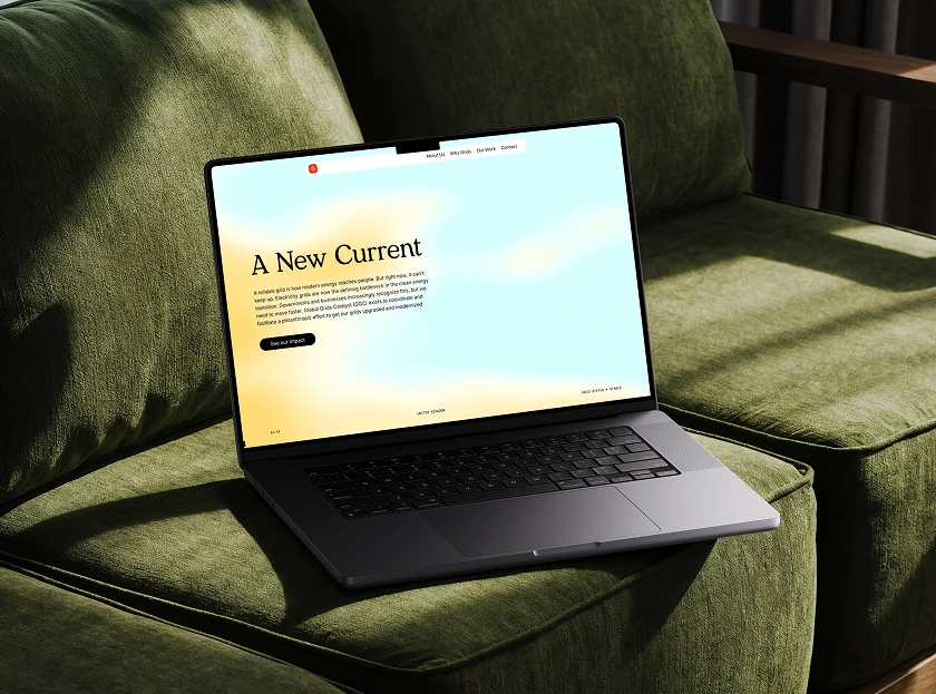 Global Grids Catalyst website homepage hero section on a laptop mockup, showing the heading 'A New Current' over a warm gradient background, built by Code & Wander.