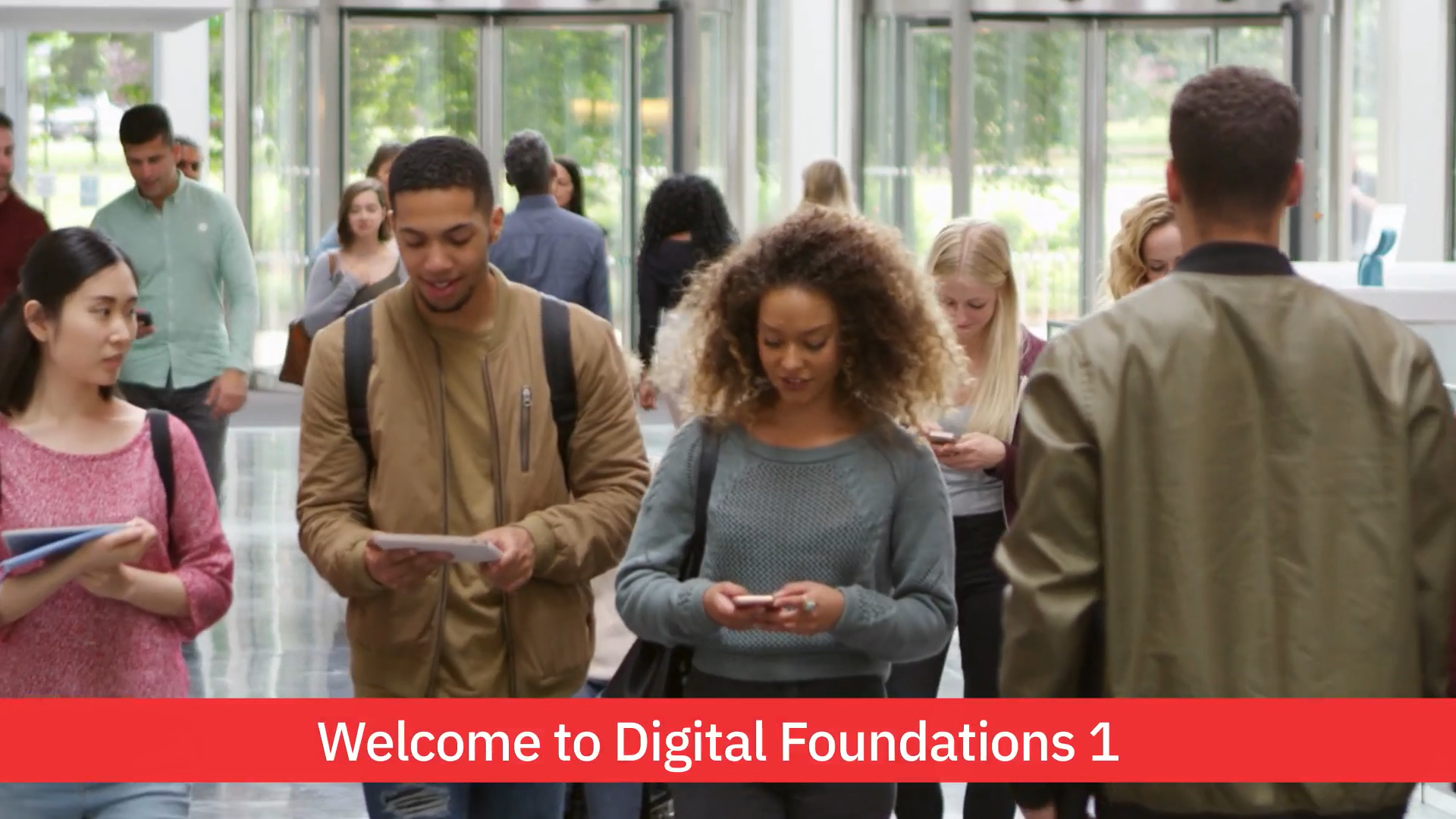 Thumbnail of YouTube video, with people walking into a building and text along the bottom that reads "Welcome to Digital Foundations 1".