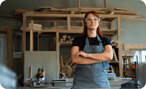 Woman standing in her workshop
