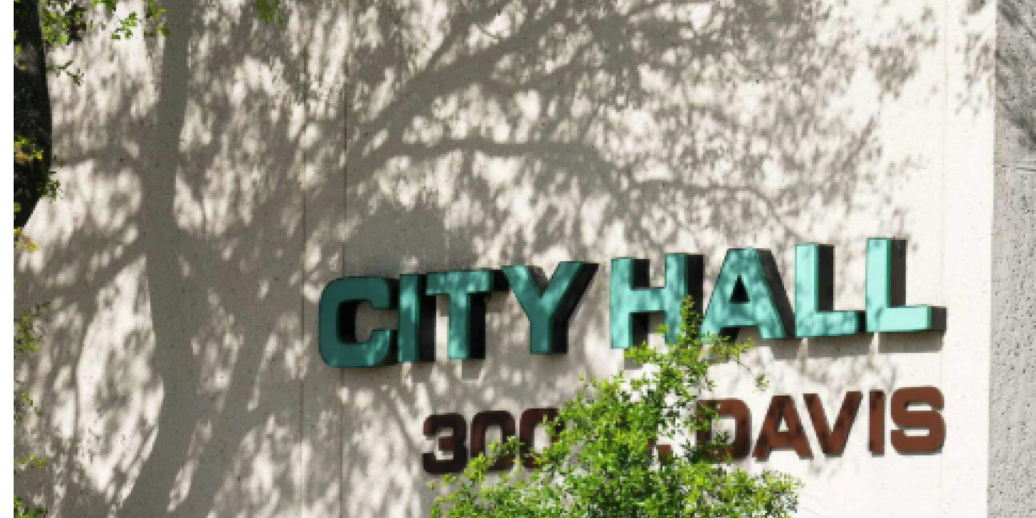 City official placed on leave as case heads to court