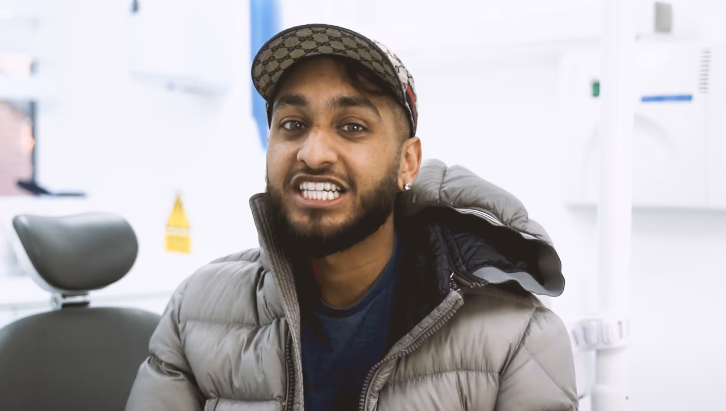 Smiling in dental chair after invisalign