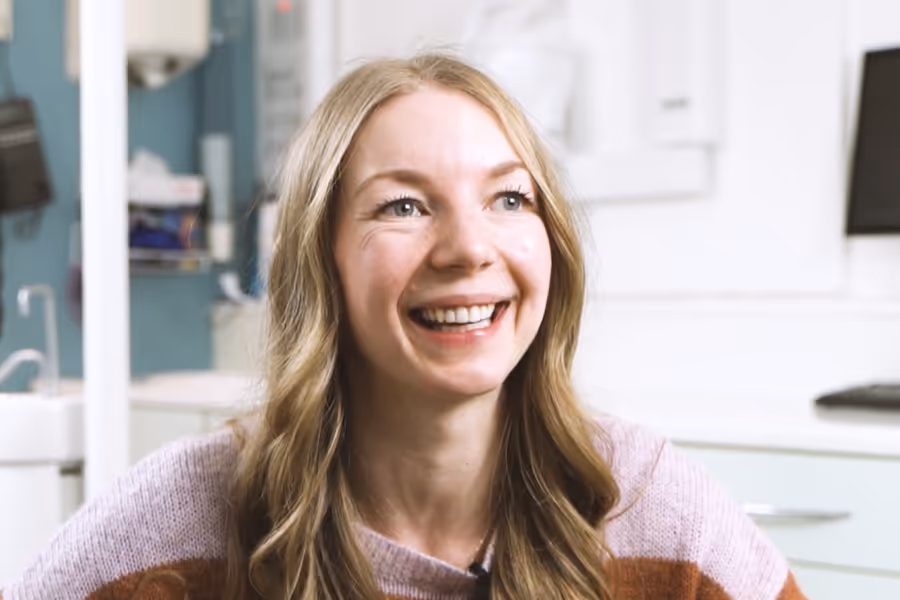 Smiling woman in dental chair