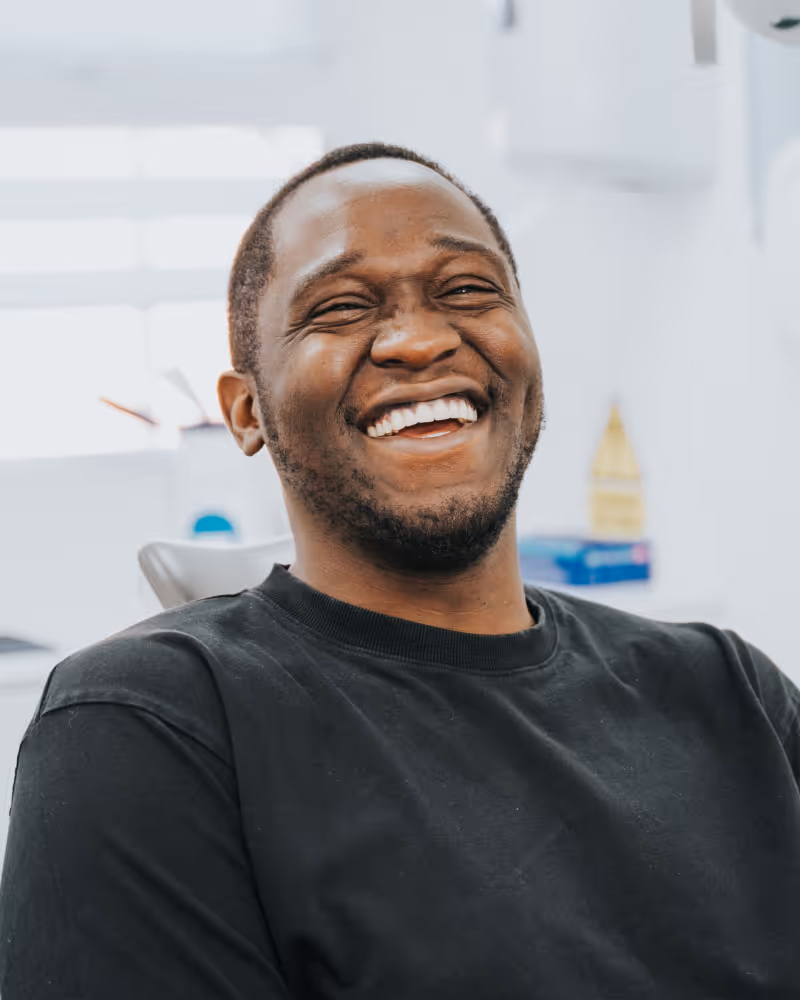 Smiling in dental chair