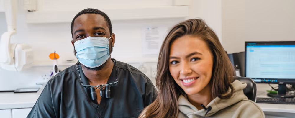 Dentist and patient sitting