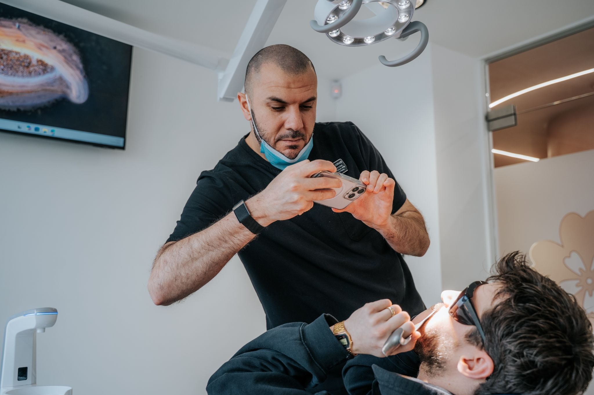 Dentist and patient sitting