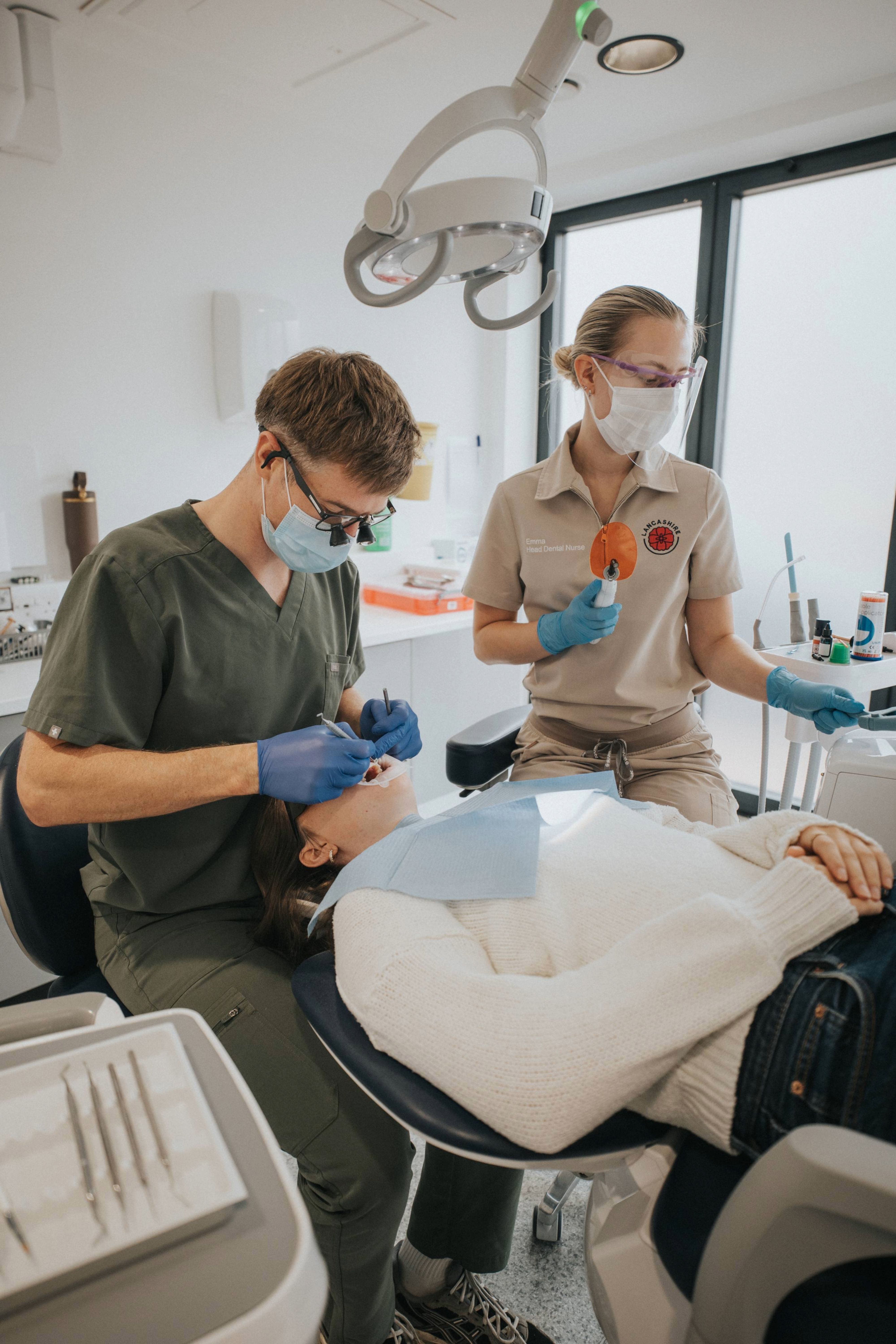 Dentist and patient sitting