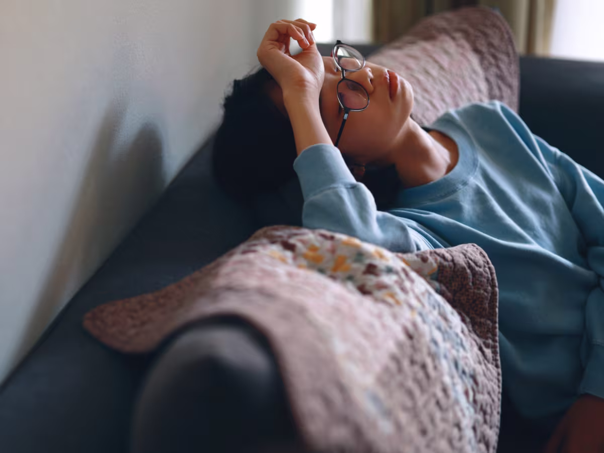 girl sitting on couch