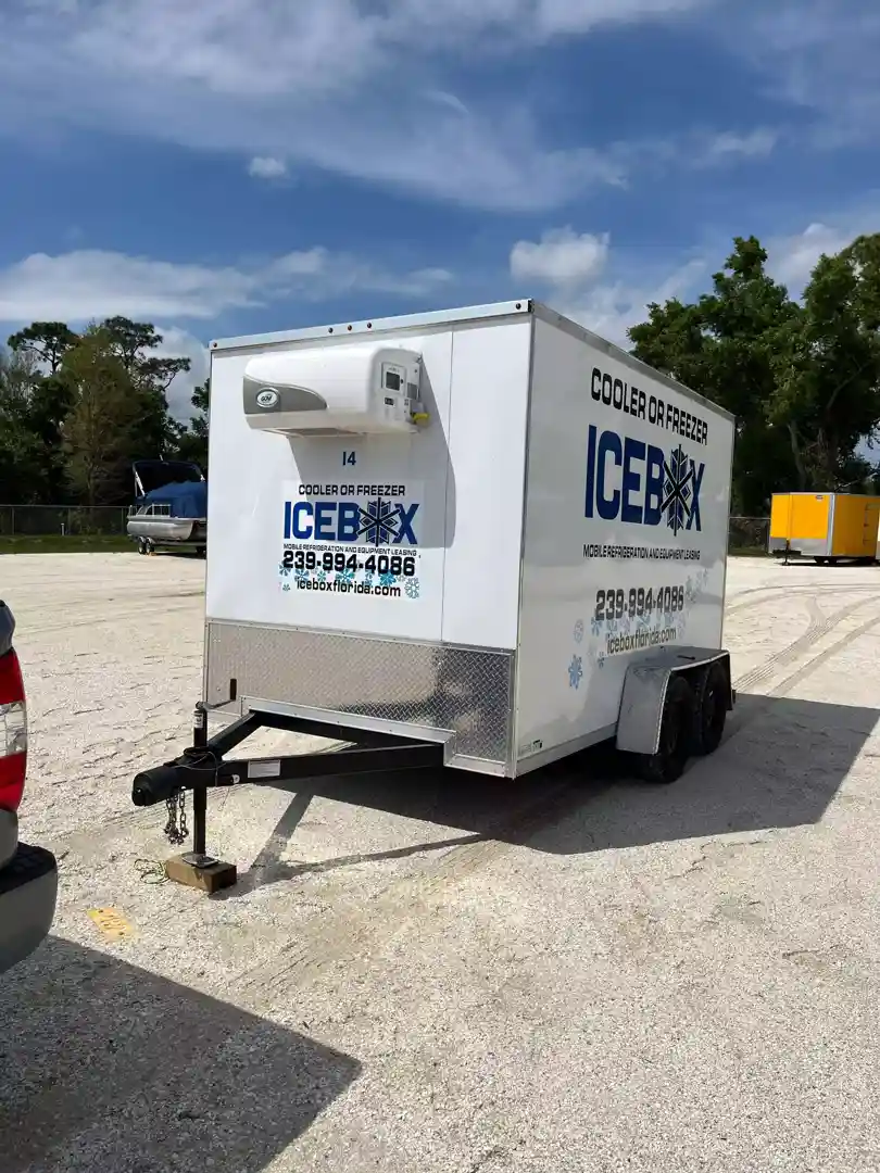 A mobile cooler trailer in use at an outdoor festival or farmers market, blending in with the surroundings - refrigeration rental Raleigh NC A mobile cooler trailer in use at an outdoor festival or farmers market, blending in with the surroundings - refrigeration rental Raleigh NC