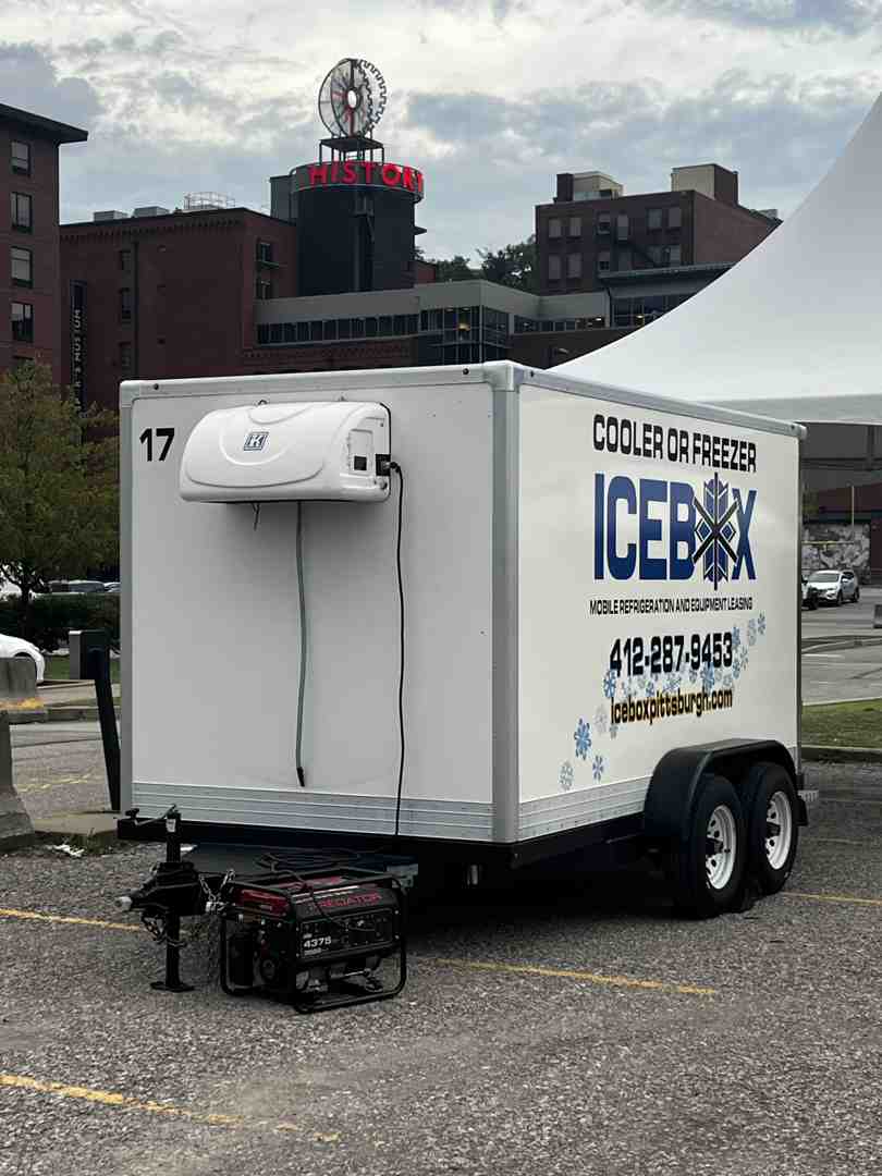 Icebox mobile cooler trailer at an outdoor event - commercial kitchen refrigeration Icebox mobile cooler trailer at an outdoor event - commercial kitchen refrigeration