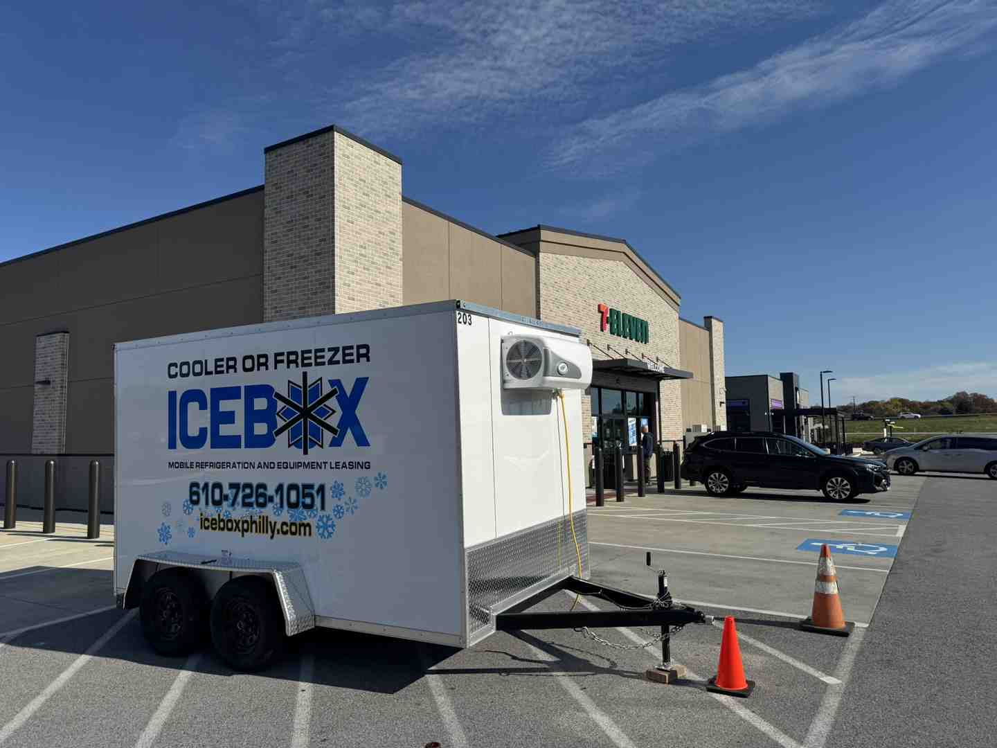 110-volt mobile freezer unit parked behind a restaurant - portable freezer for hire