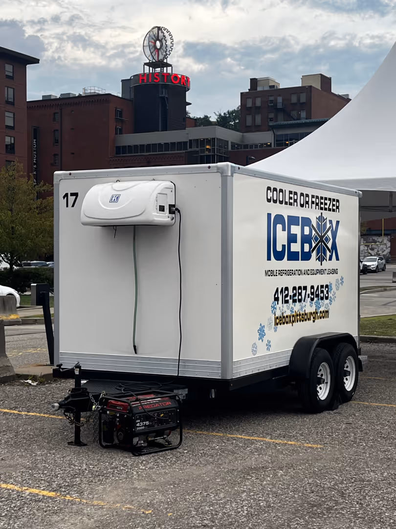 temporary freezer storage mobile trailer on-site at restaurant outdoor event - temporary freezer storage