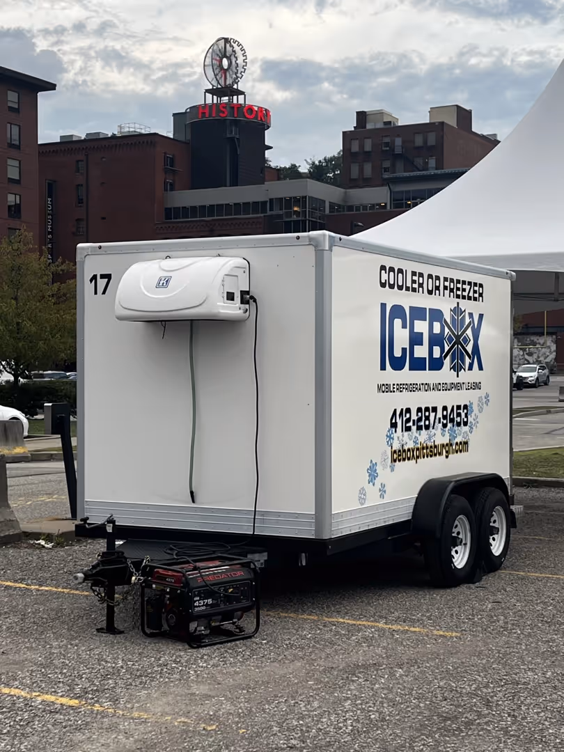 Portable refrigeration unit mobile cooler trailer at outdoor event venue