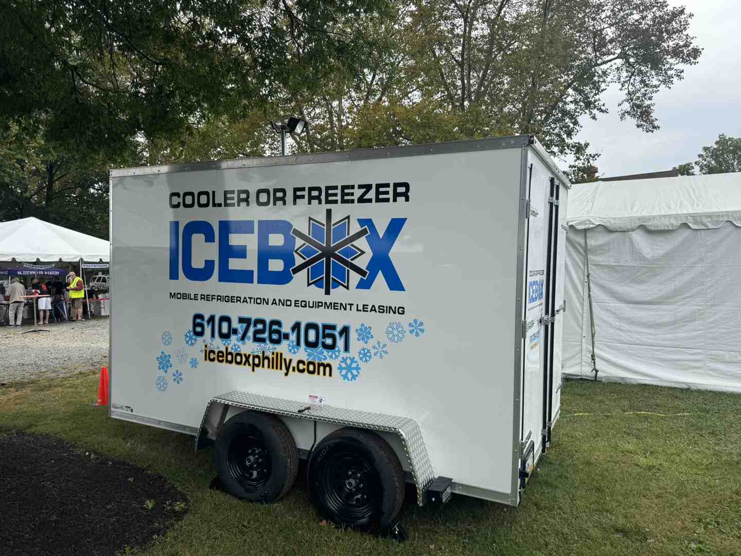 portable flower cooler trailer at outdoor event