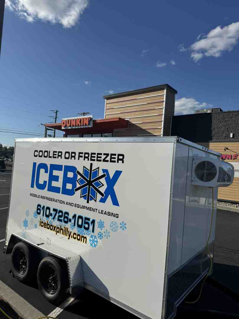 A mobile cooler trailer plugged into a standard 110V outdoor outlet at a local venue A mobile cooler trailer plugged into a standard 110V outdoor outlet at a local venue