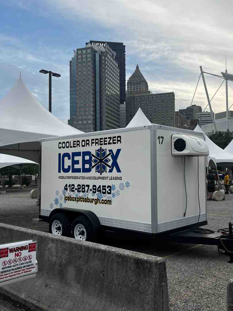 clean modern refrigerated trailer parked on-site for event cold storage