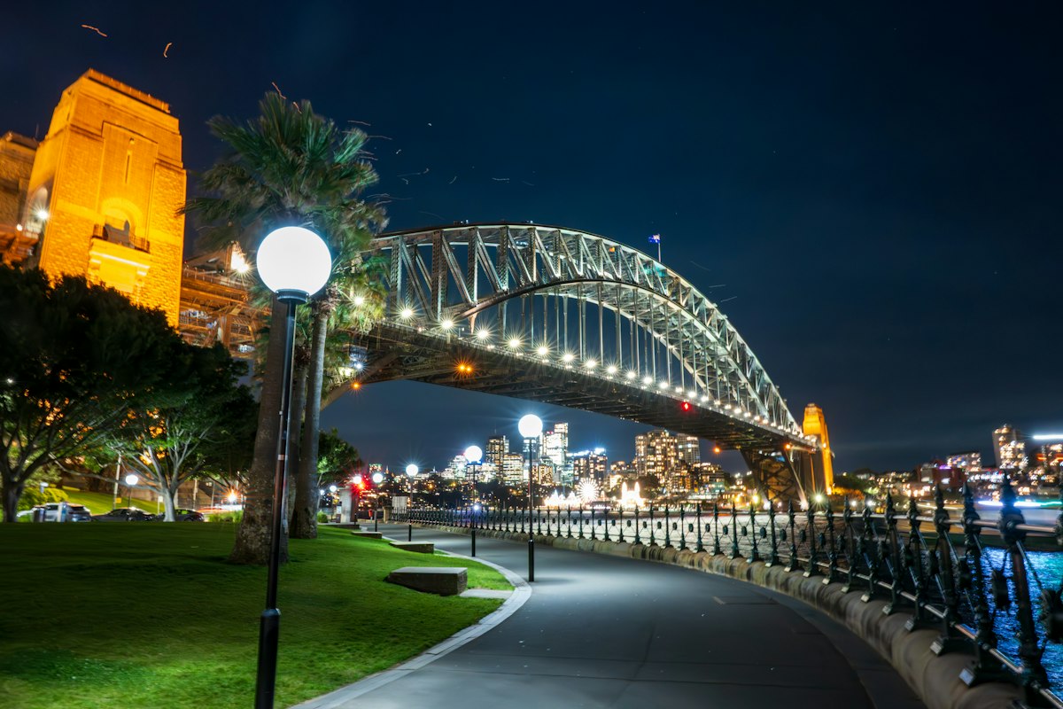 Sydney Harbour Bridge and Opera House lit up at night