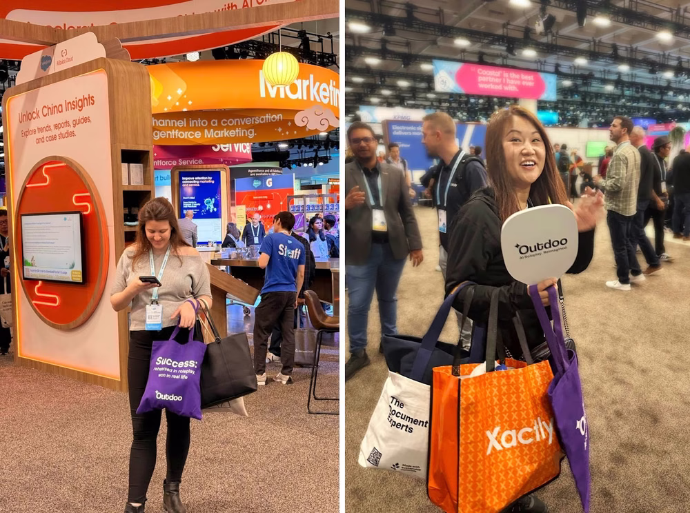 Visitors at Dreamforce 2025 carrying Outdoo AI tote bags and merchandise across the event floor, showcasing strong brand presence and engagement.