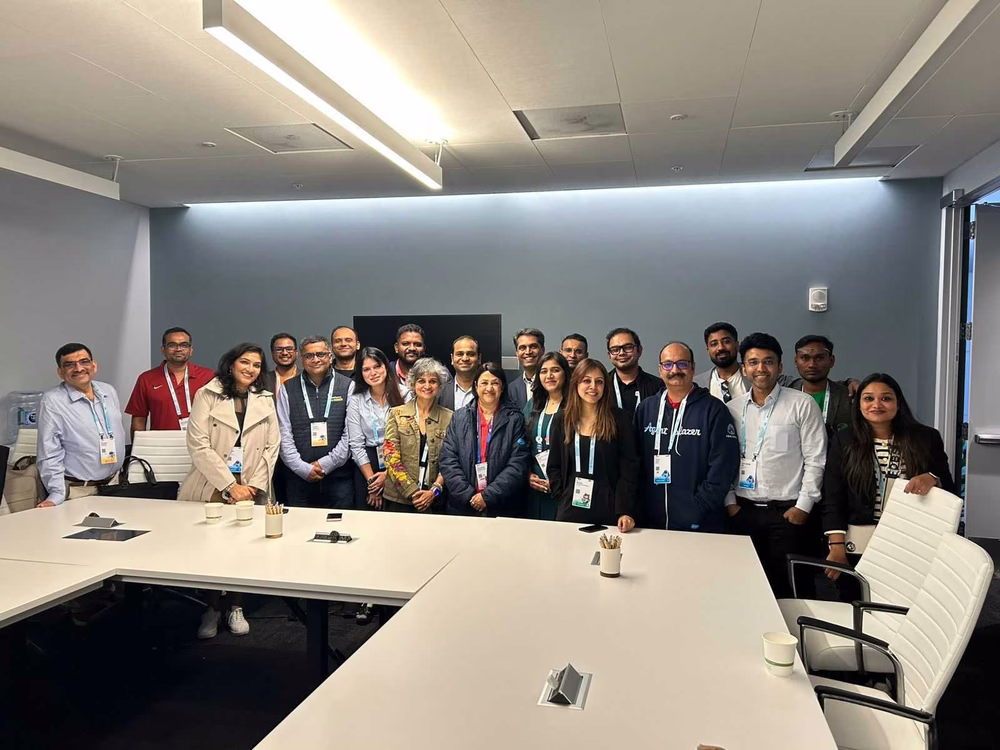 Group of attendees gathered for a discussion session with Salesforce India leadership at Dreamforce 2025 with Arundathi Bhattacharya, sharing insights on AI and sales enablement.