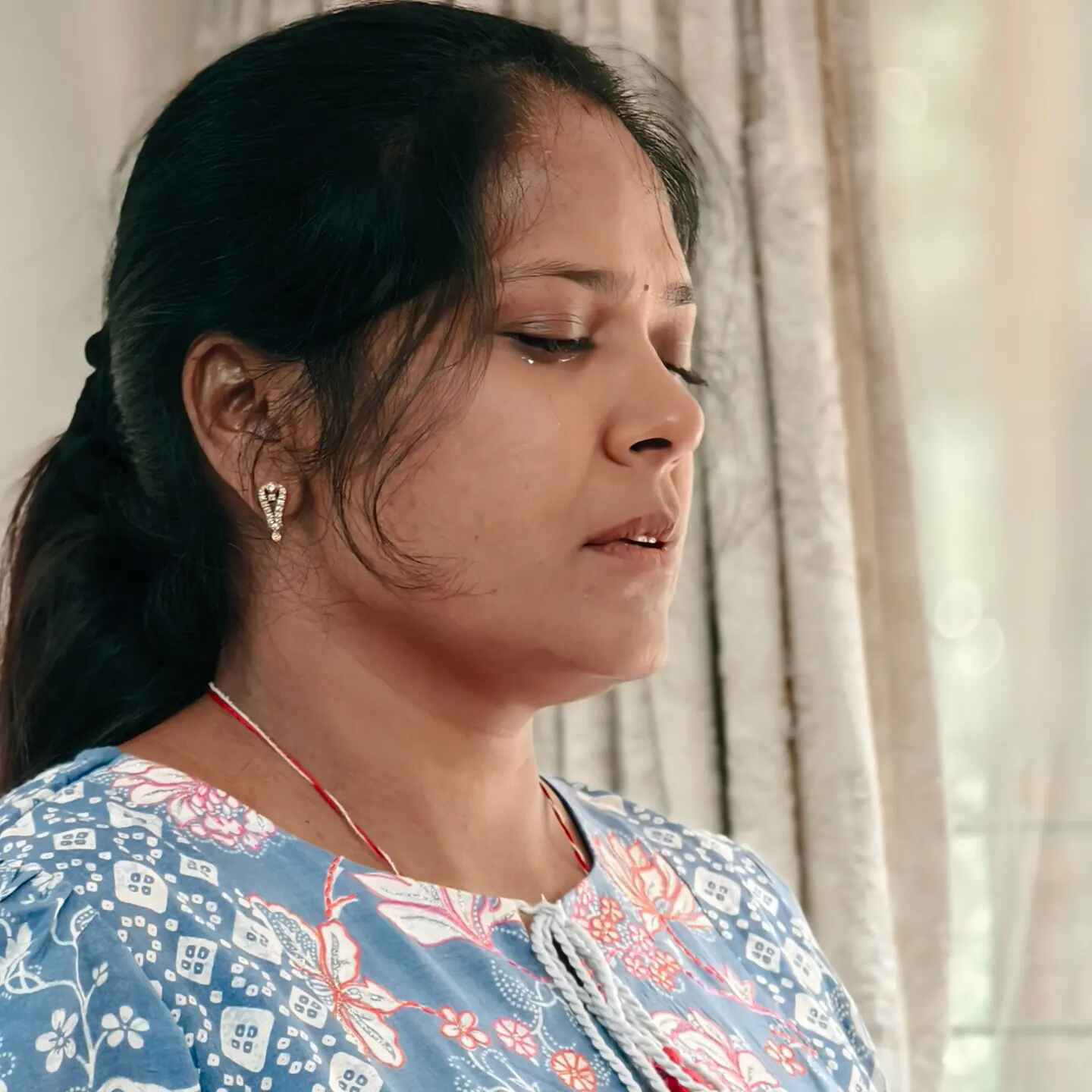 a lady in tears during NLP practitioner training course in India