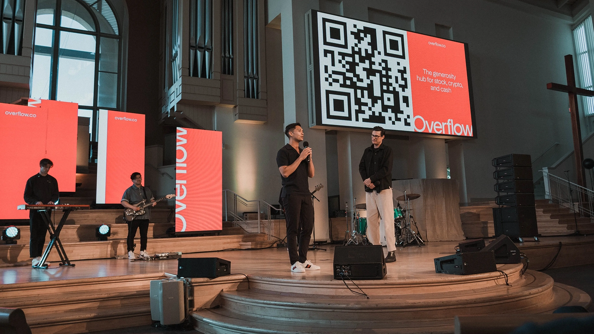 Vance Roush CEO of Overflow on stage at Overflow Partner ZOE Churches Sunday gathering