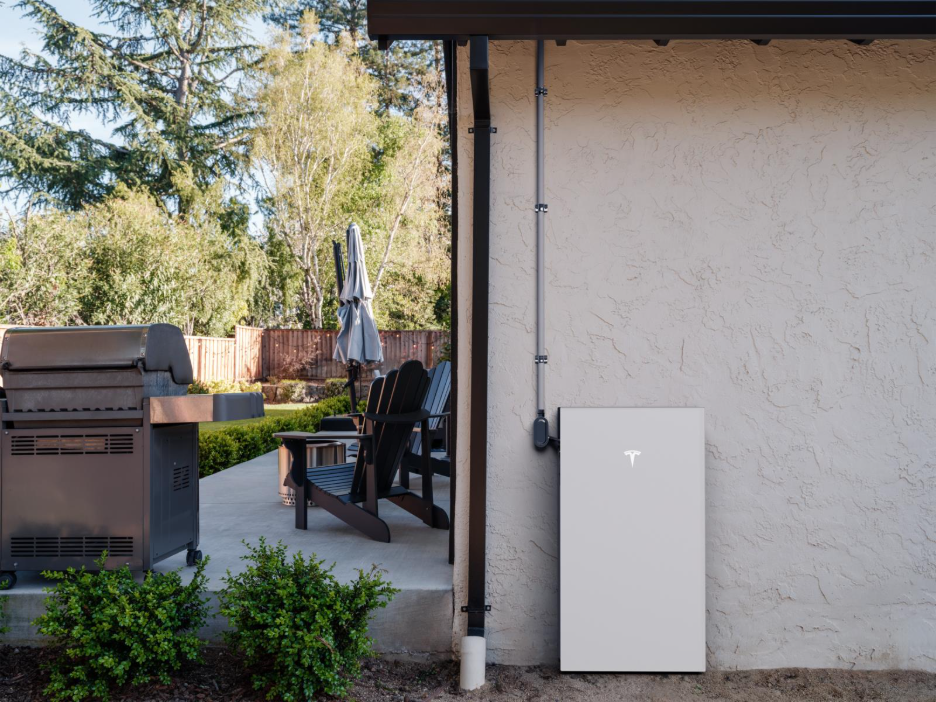 Tesla Powerwall on the outside of a building in Canada