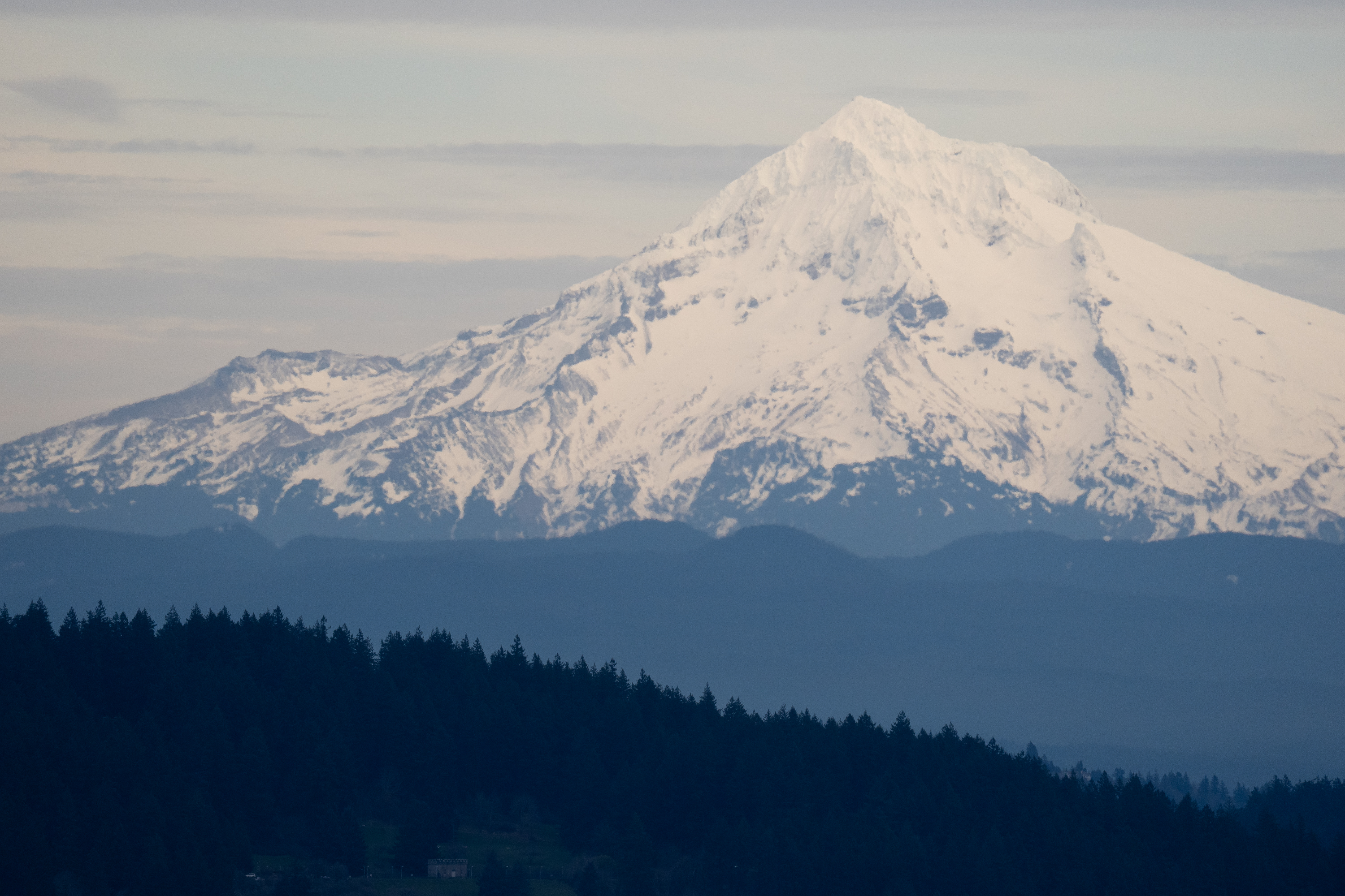 Poor snowpack covers Mt. Hood on a warmer than average day, reaching 56 degrees Fahrenheit, in Portland, Ore., on Feb. 3, 2026.