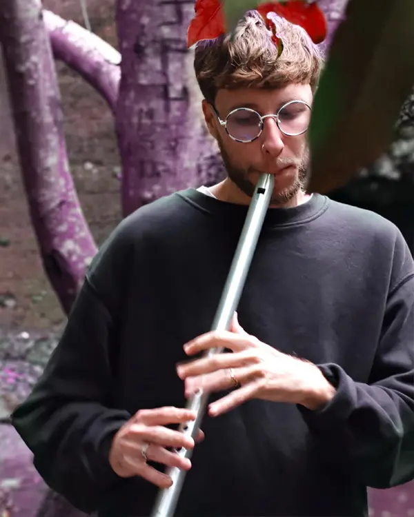 picture of me playing the flute in the woods