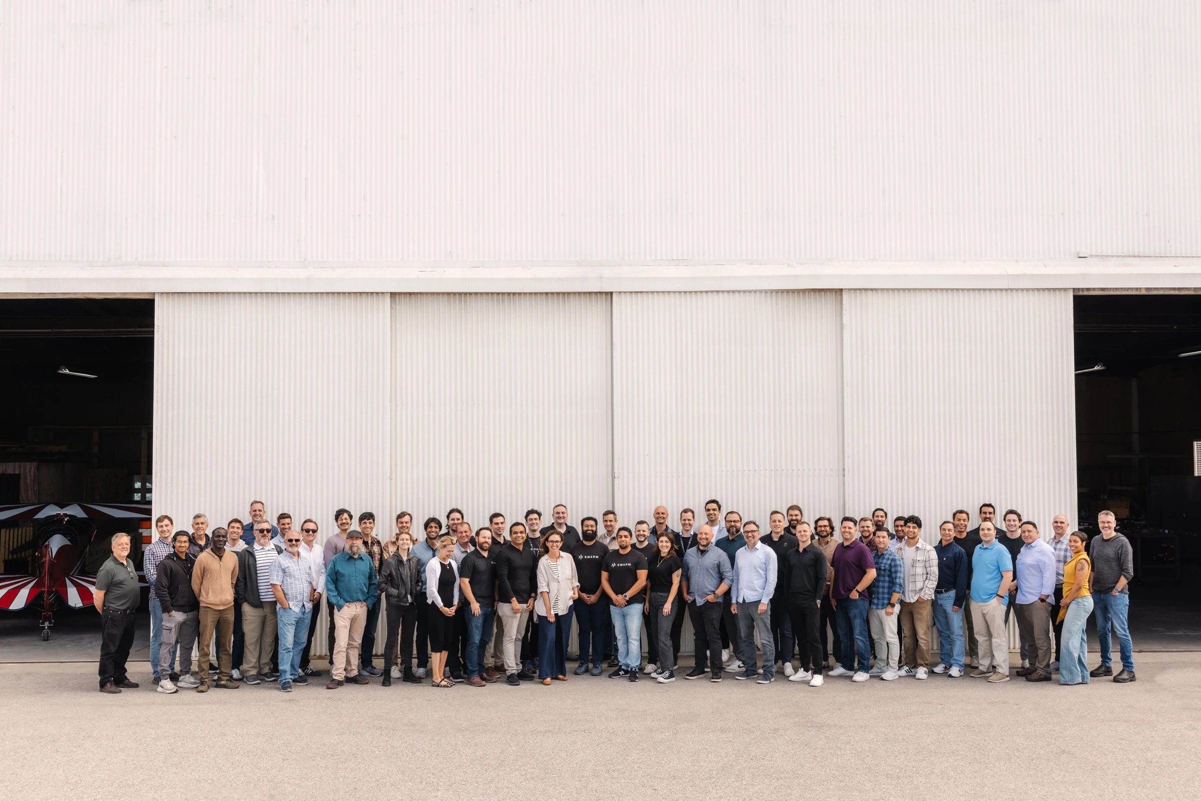 The Swarm Aero team outside the hangar
