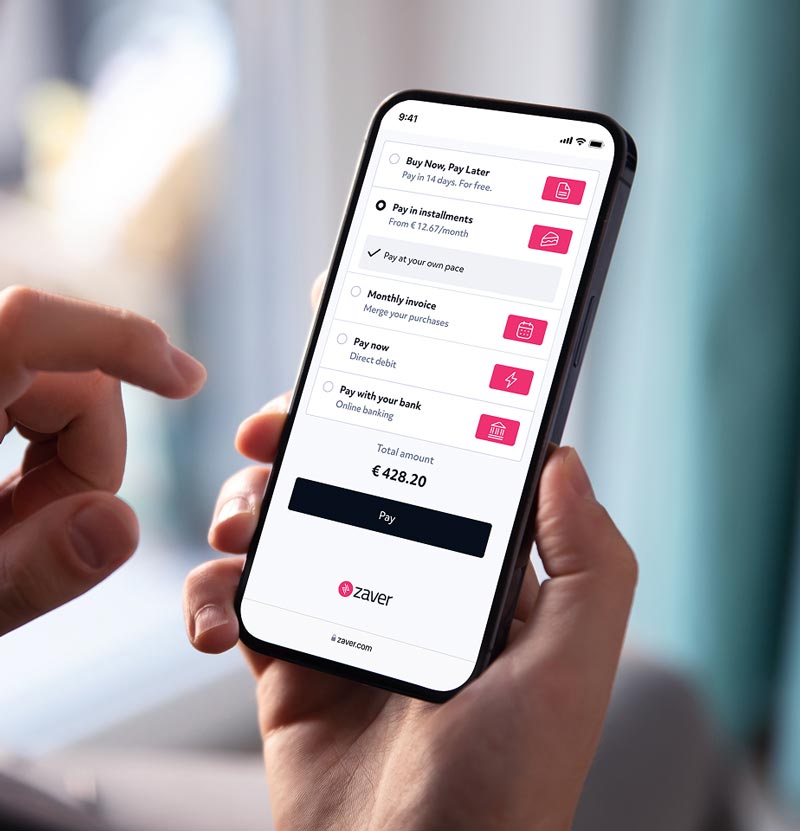 A person holding a phone using Zaver checkout