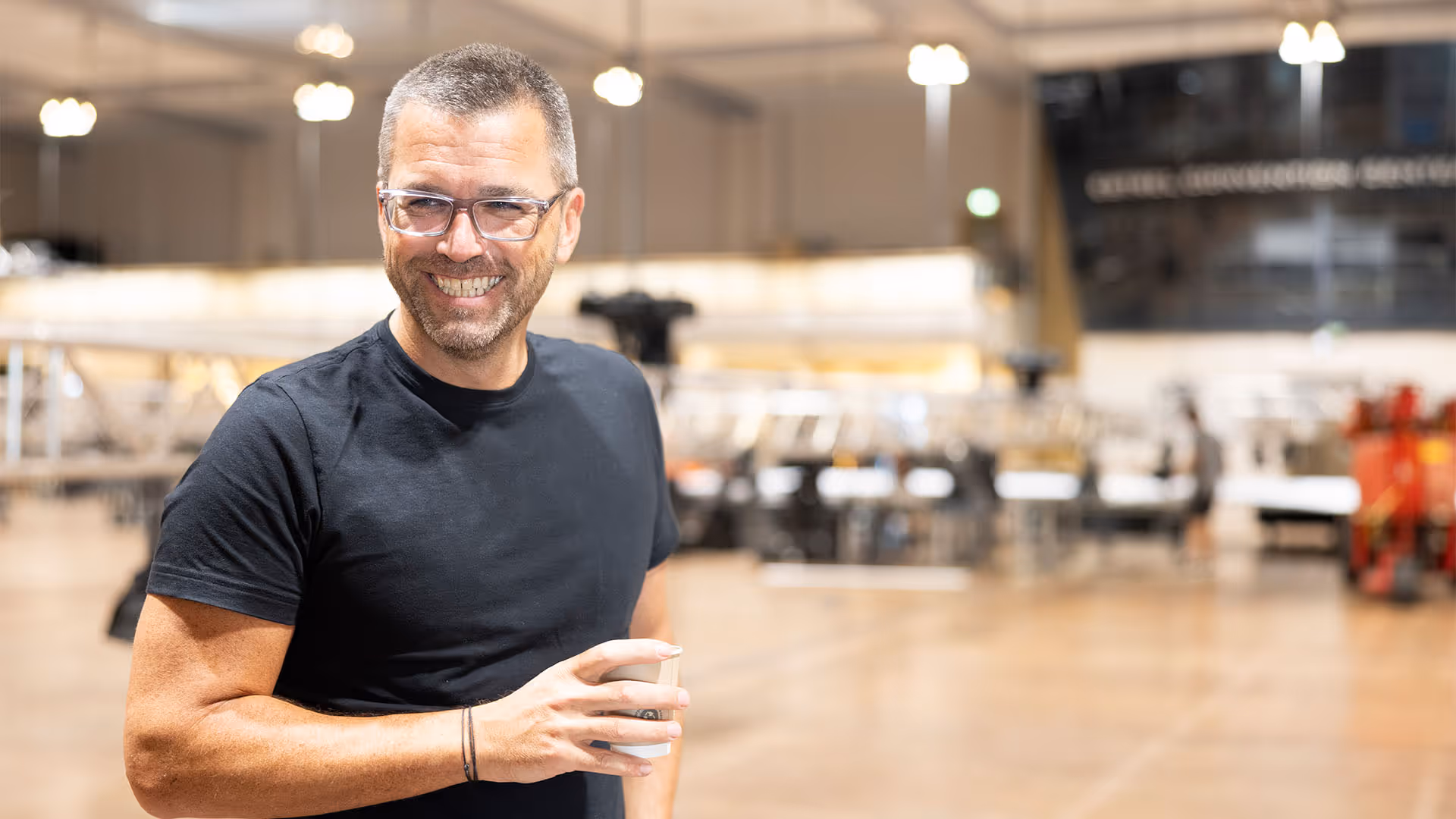 Juergen Kuenkel, Founding Partner and Managing Director, onsite smiling at camera