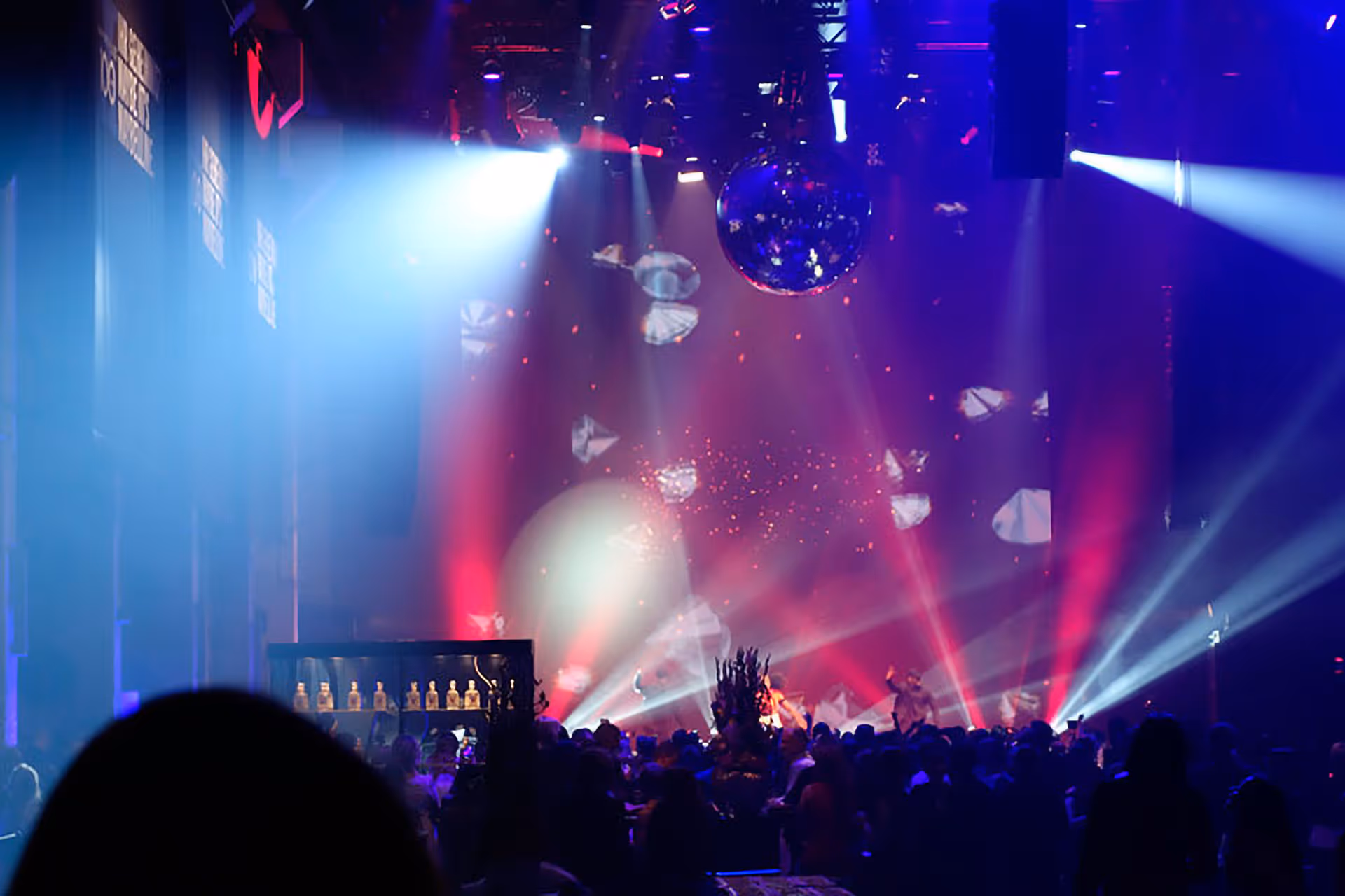 Close up of lighting and glitterball at corporate launch event.