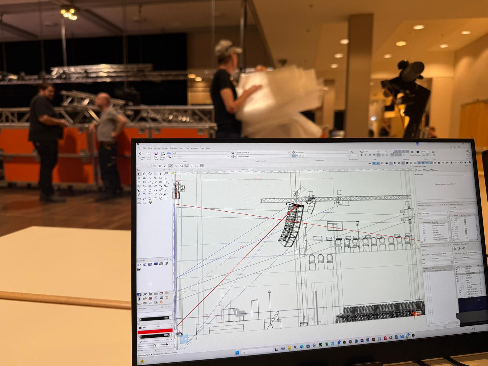 Detailed CAD drawing of meeting room, seating plan, stage, lighting and sound.