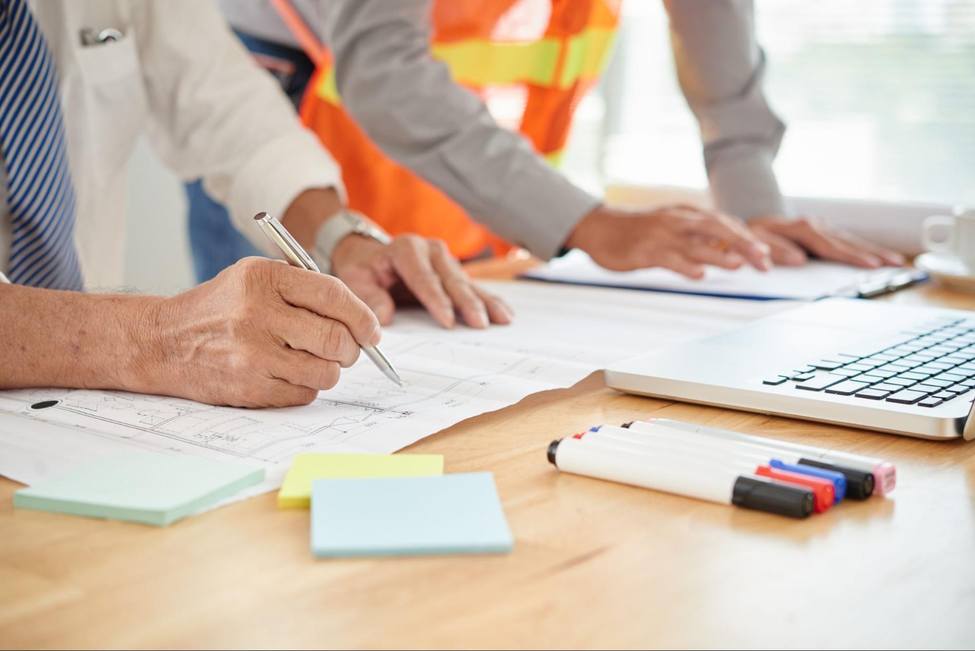 A professional reviewing the construction permit application.