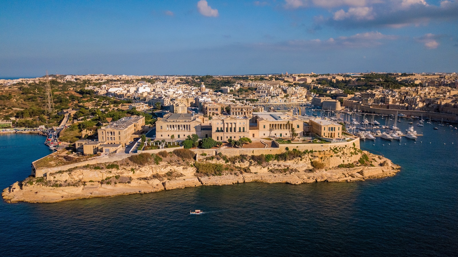 Aerial view of Malta’s fortified harbour landscape, illustrating a small island with global reach