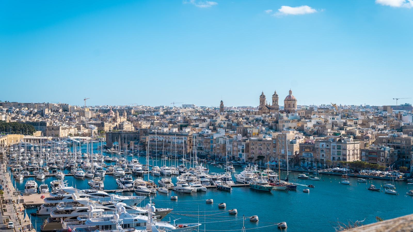 Malta marina and surrounding cityscape, reflecting the island’s family office and private wealth proposition