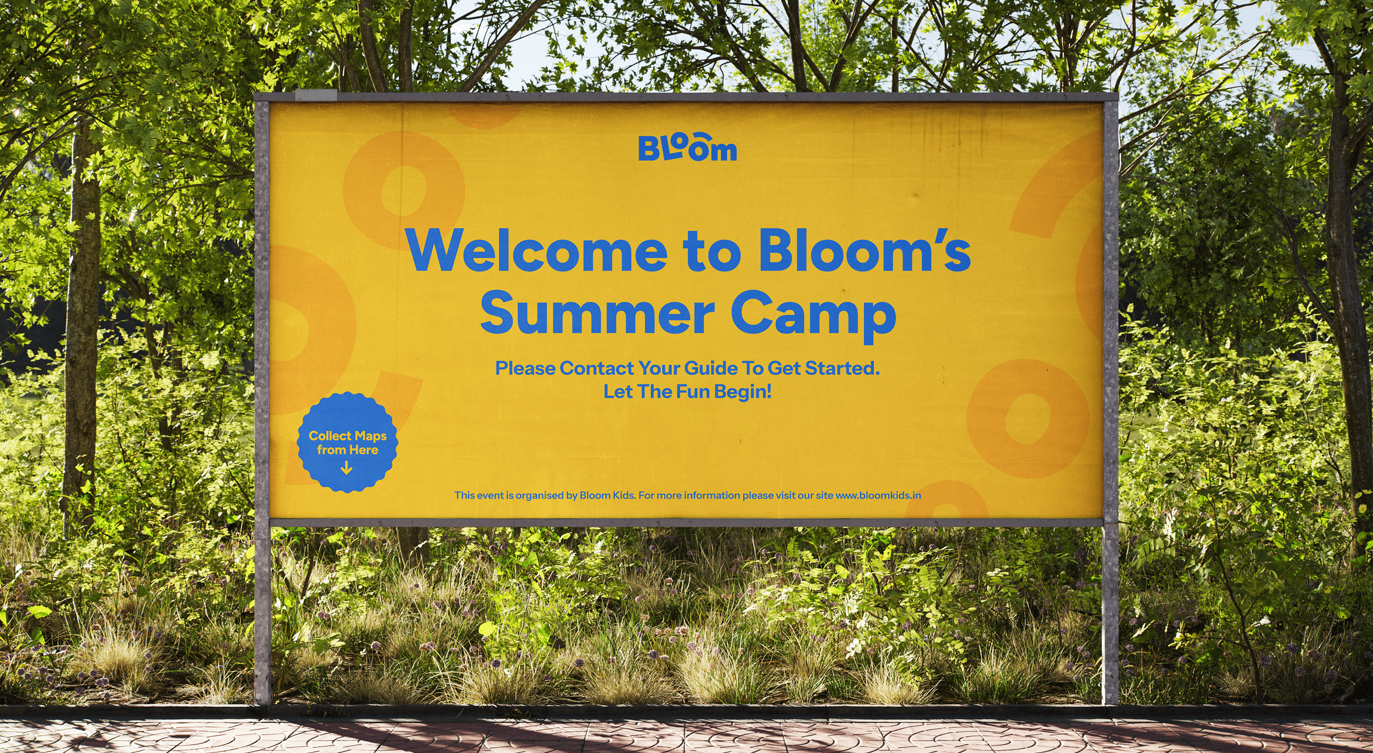 Large outdoor banner reading ‘Welcome to Bloom’s Summer Camp’ with Bloom branding on a yellow background.
