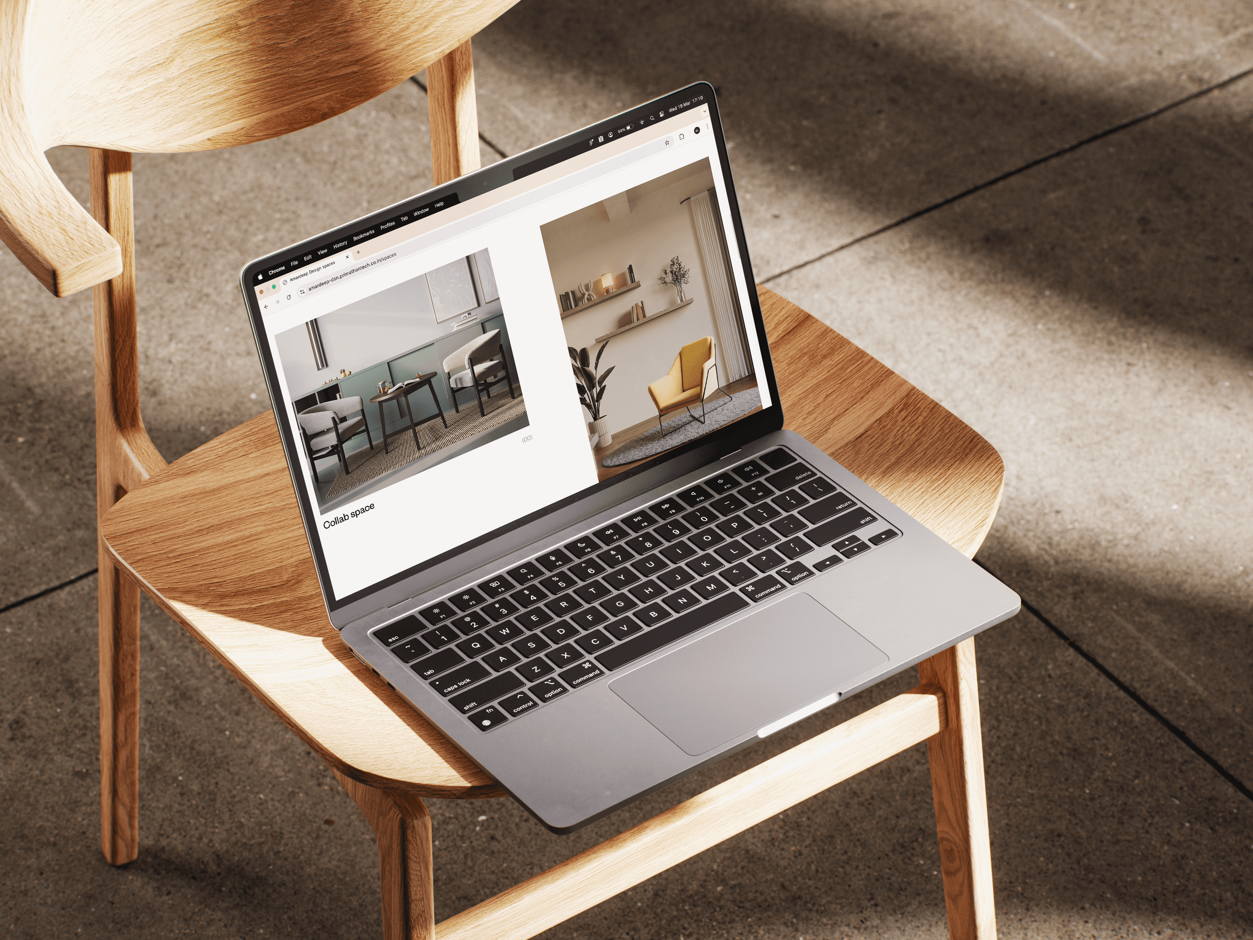 An open laptop placed on a chair showing a still from the Amardeep Design website
