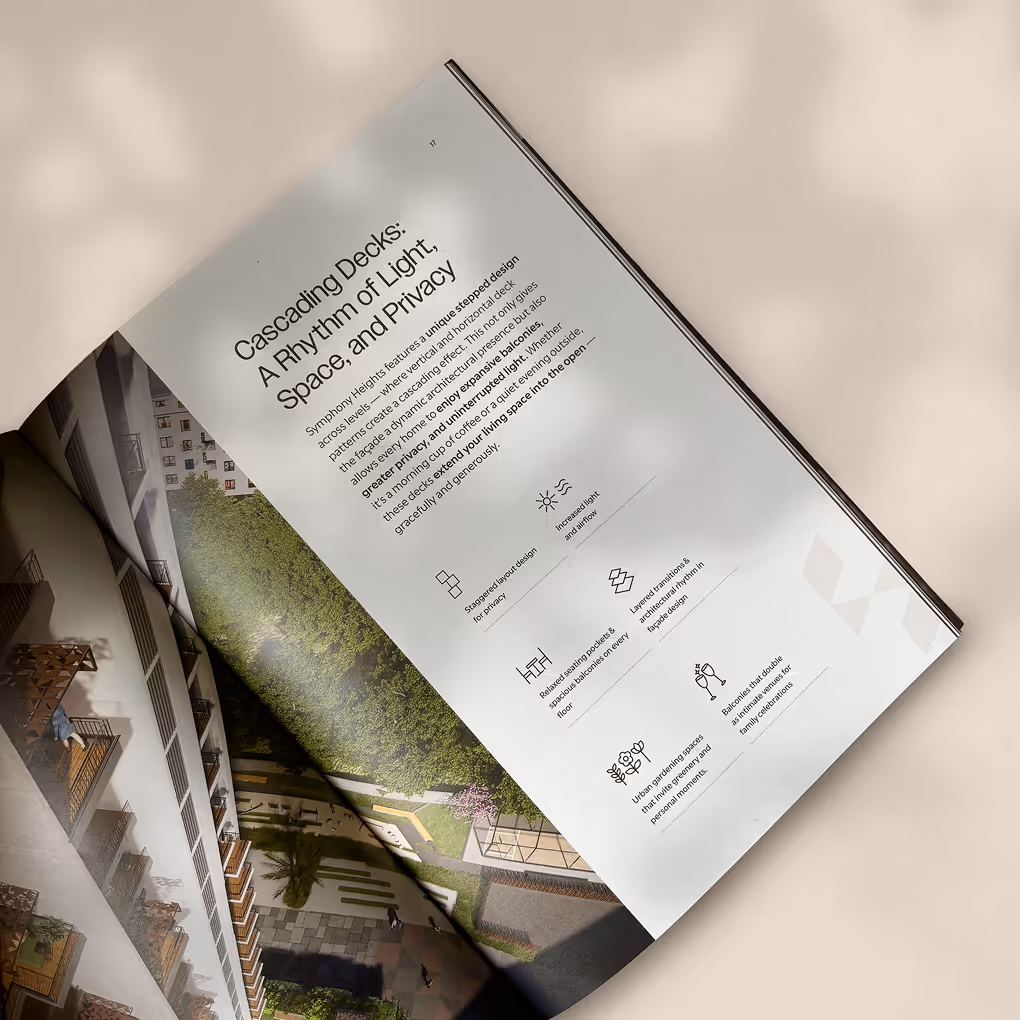 Open brochure spread displaying amenities, lifestyle visuals, and descriptive content layouts.