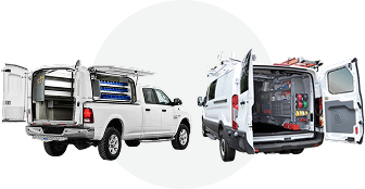 Rear view of a white pickup truck and a white utility van with open rear doors showing empty and organized storage interiors.