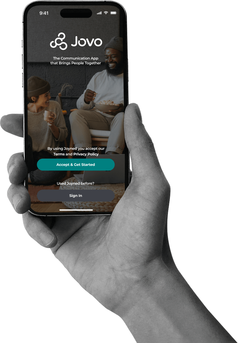 An image of phone in someones hand on the welcome screen of the Jovo app.
