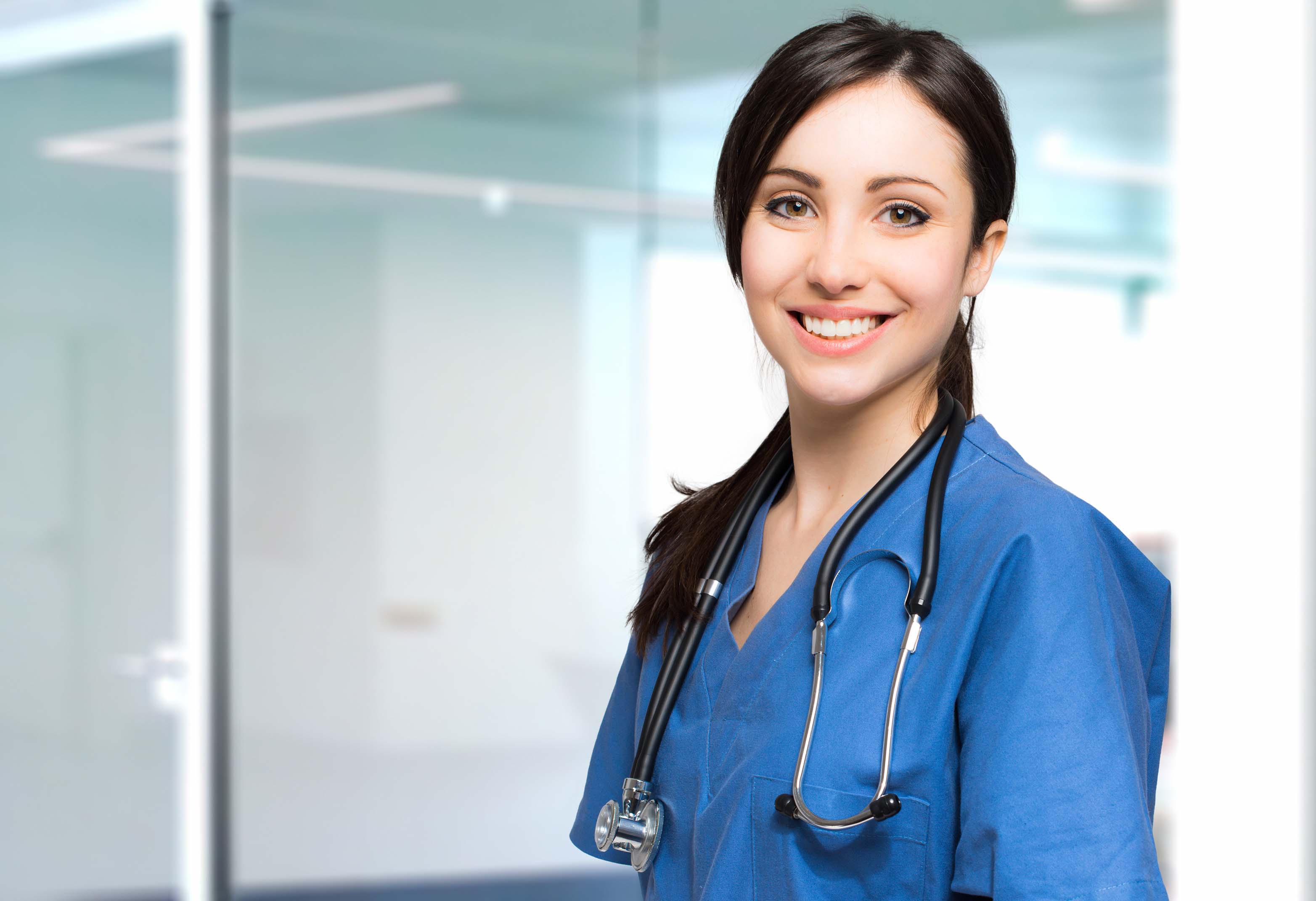 Professional image of nurse in blue scrubs  