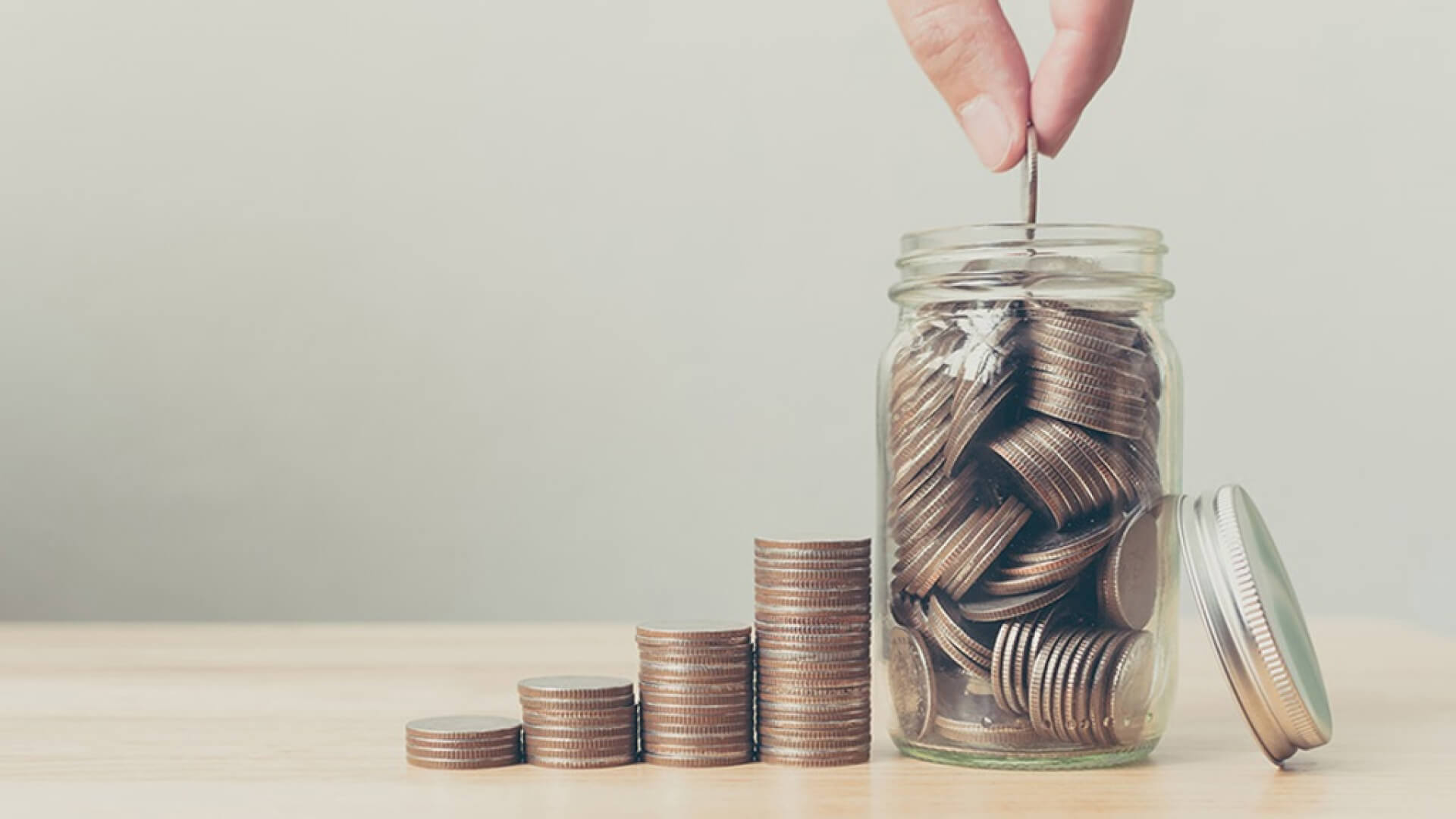A stack of coins - symbolising the adding to your super before EOFY.