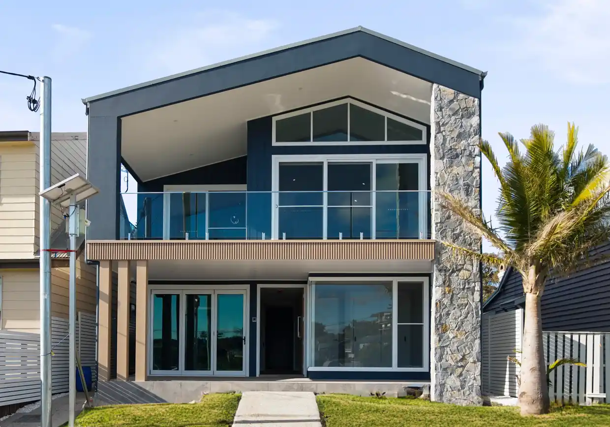 KIAMA by Berrell Homes: A modern coastal home elevated above the coastline