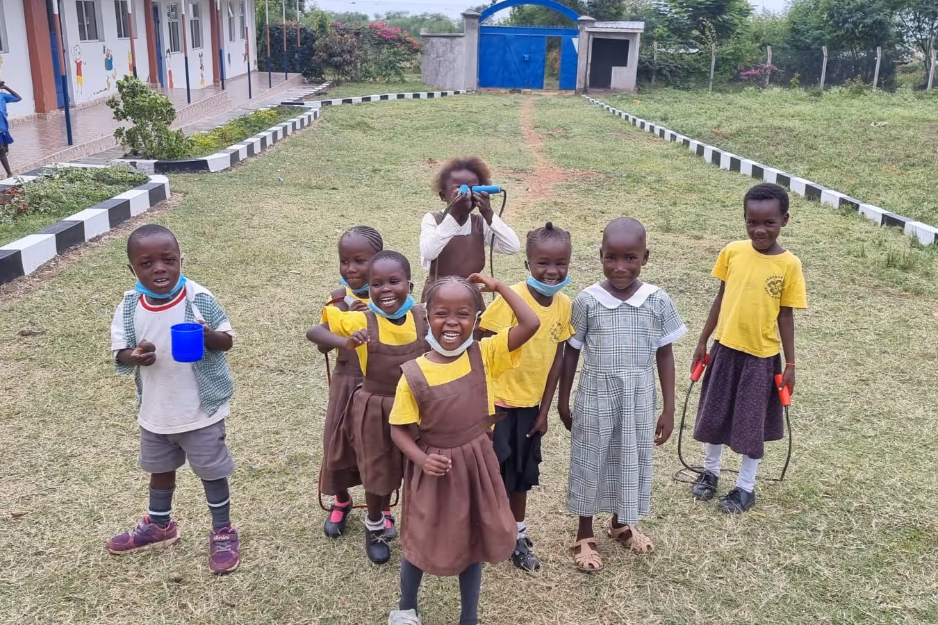 Puplis smiling in the grounds of the Seka Academy Vantage in Kenya.