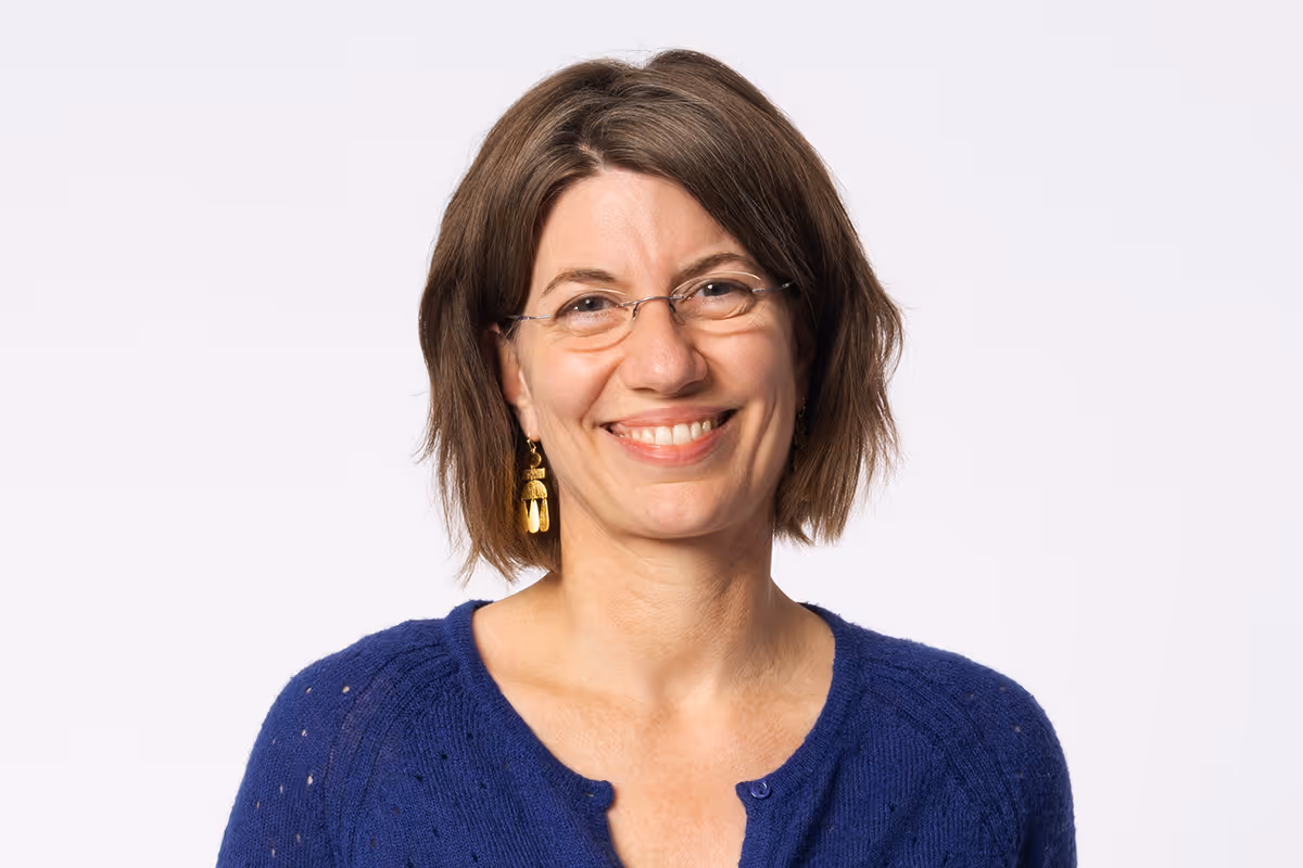 Melanie Hauer, Digital Media Designer, smiling portrait photograph.
