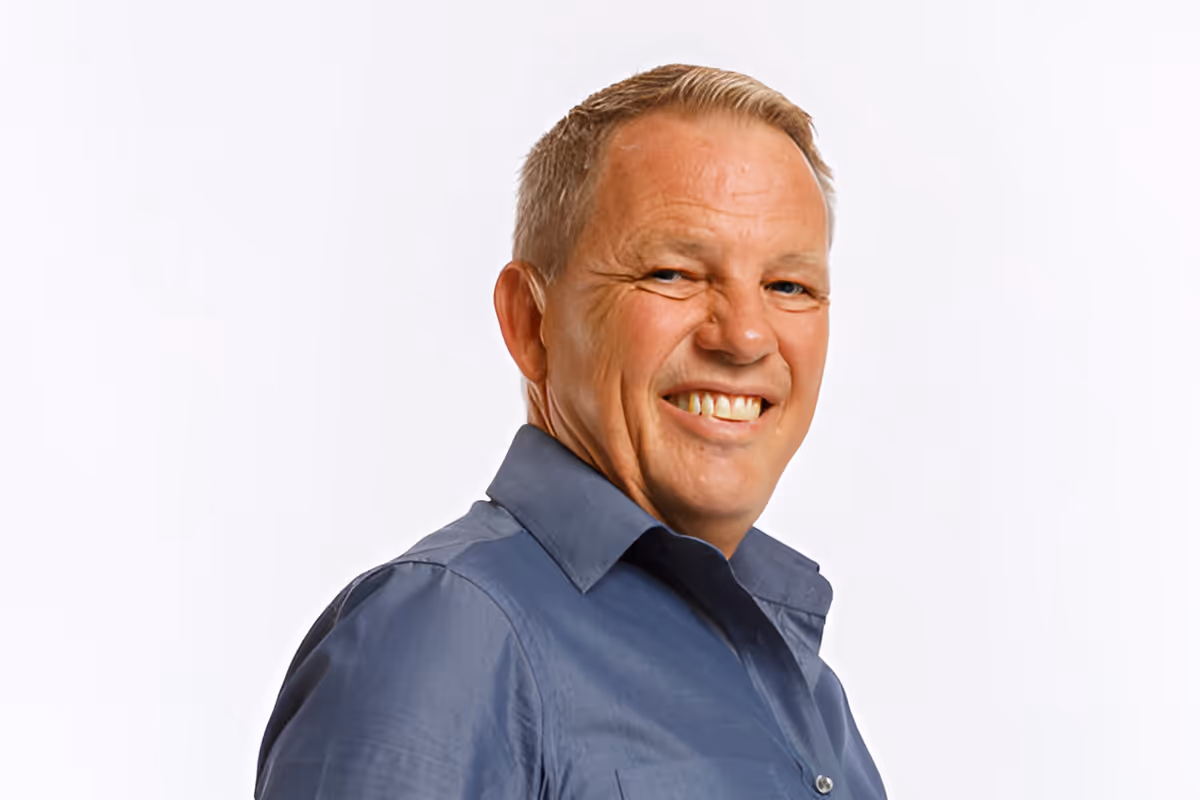 Reinoud Krijger, Production Manager, smiling portrait photograph.