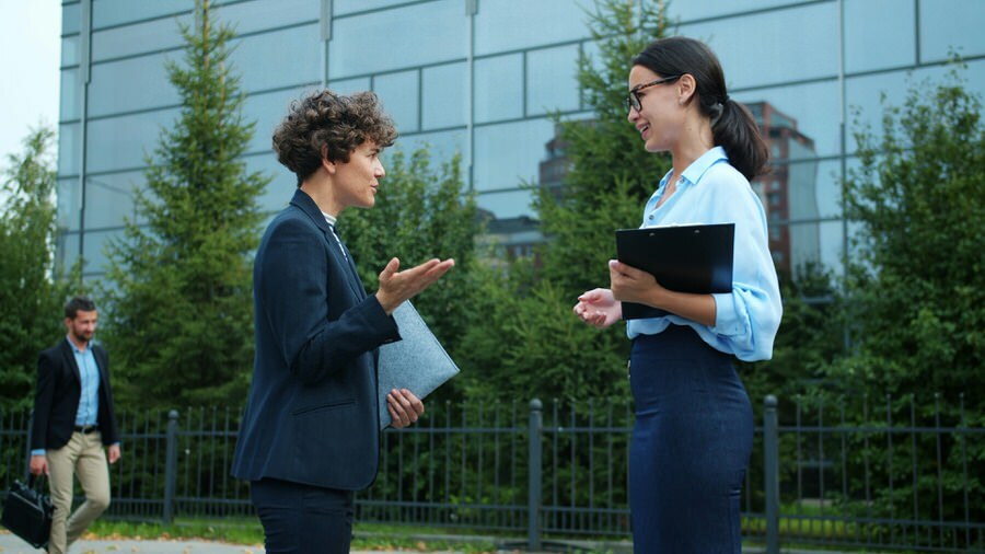 Employees talking outside