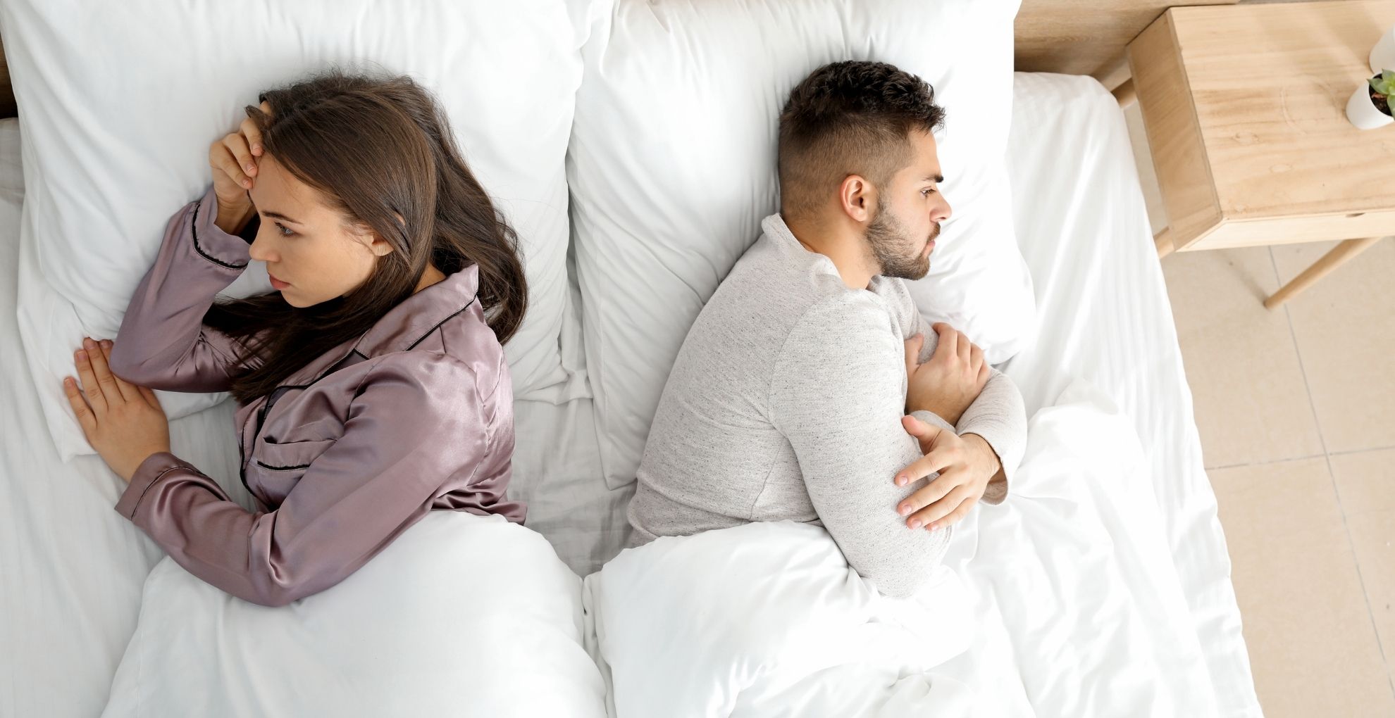 Man en vrouw met ruzie in bed