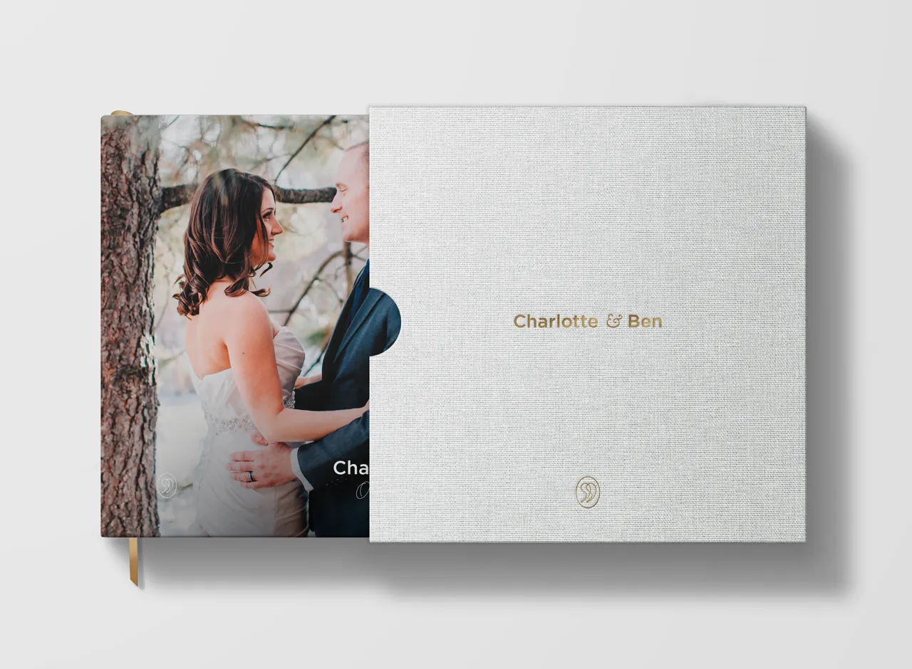 StoryTerrace - Books That Matter - Charlotte & Ben's wedding album in a custom slipcase.