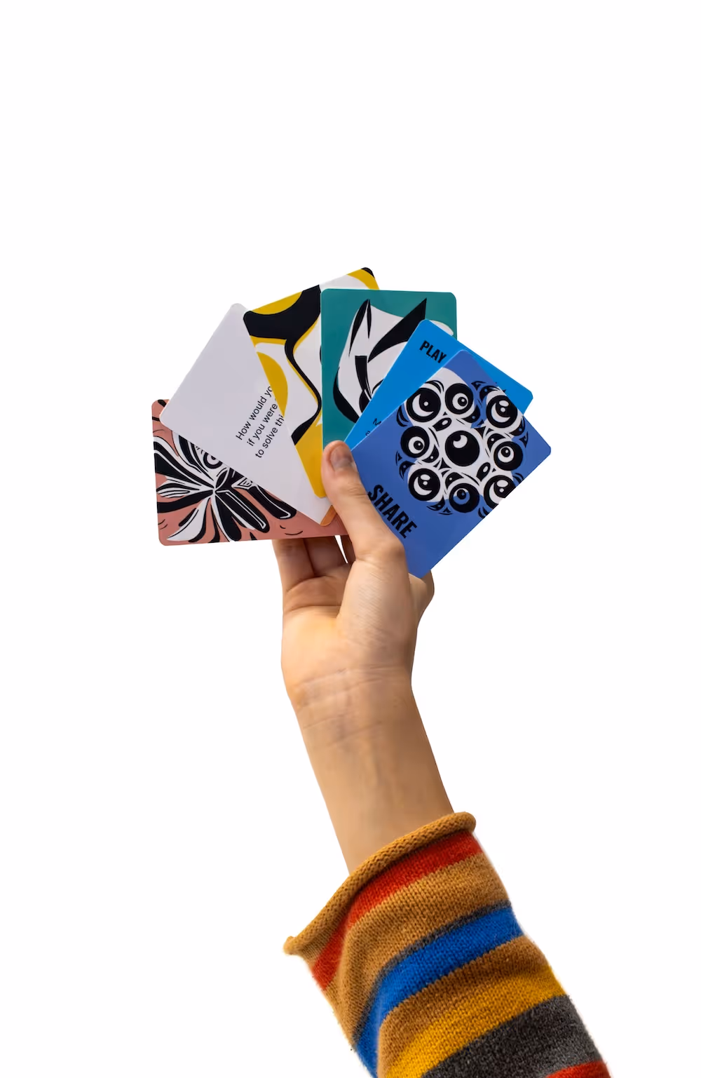 Picture of Playful Struggles card game, hand holding cards
